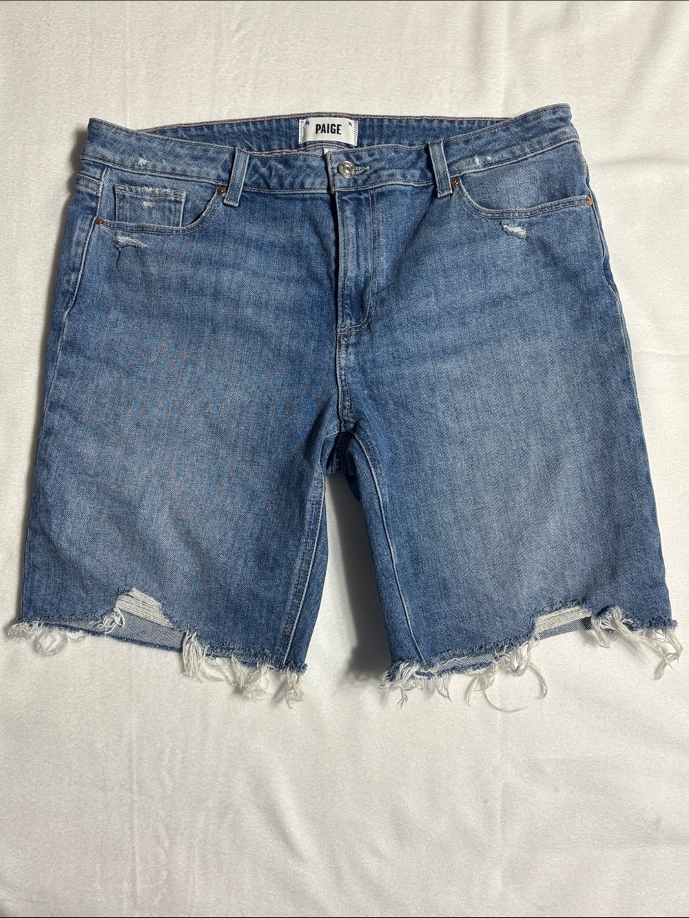 PAIGE Wanda Jax Knee Distressed Denim Cutoff Shorts